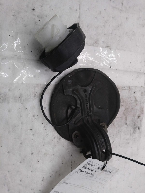 Used Fuel Filler Door fits: 2012 Jeep PatriotGrade A