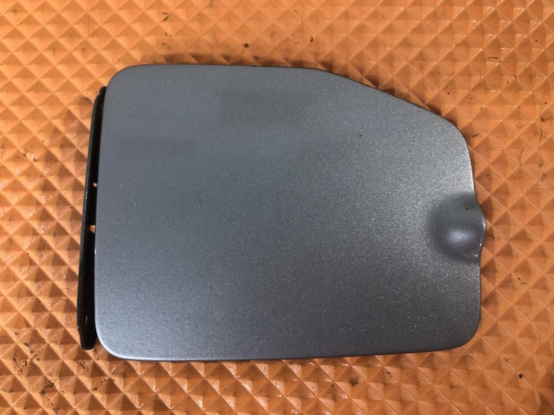 1998-2004 Nissan Frontier Fuel Gas Tank Door Sand Metallic (CV0) Oem