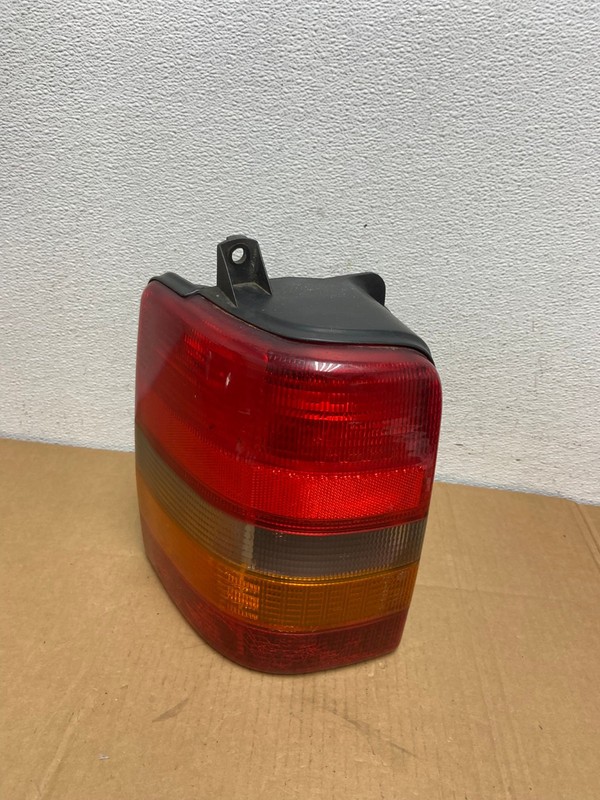 1993-1998 Jeep Grand Cherokee ZJ Left Driver Side Tail Light Oem AC7479 LK