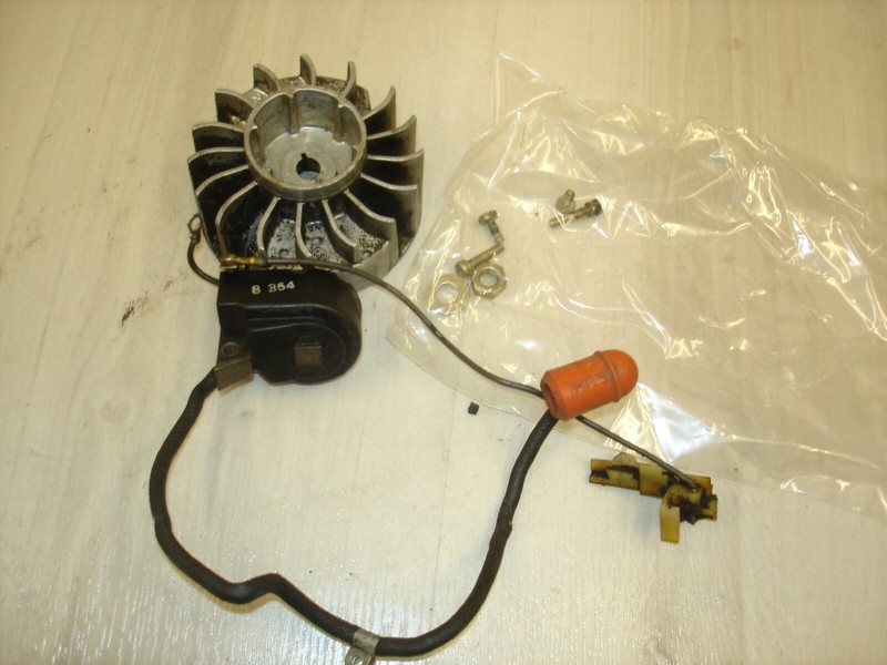 Stihl 009L 009 L coil and flywheel chainsaw part bin 204