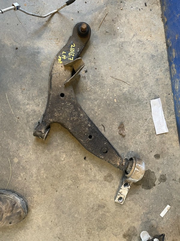04-09 NISSAN QUEST LH FRONT LOWER CONTROL ARM - USED