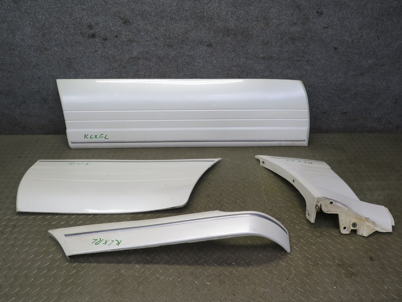 03-07 LEXUS LX470 FRONT & REAR LEFT DOOR FENDER LOWER TRIM MOLDING SET OF 4