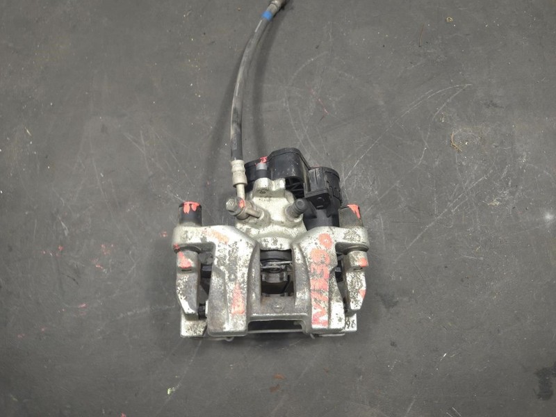 Rear Left Brake Caliper w/ Parking Brake Actuator AWD 2025 Nissan Kicks 2026