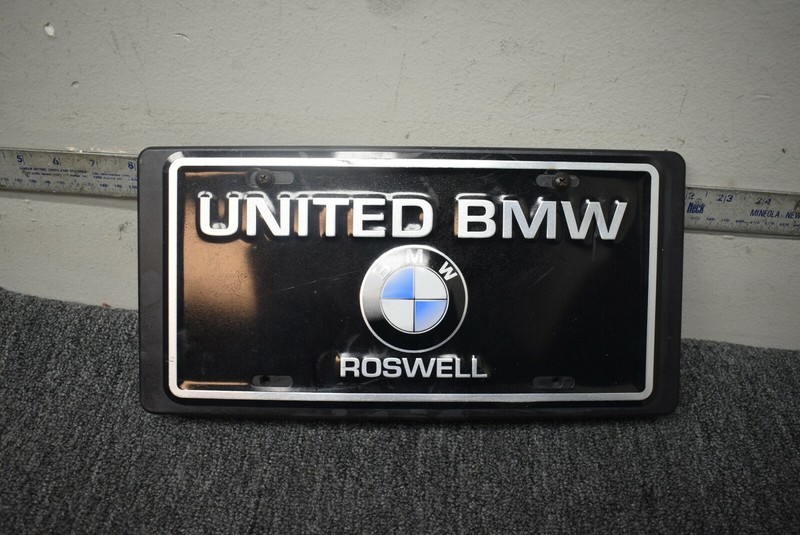 BMW FRONT LICENSE PLATE BRACKET FACTORY OEM