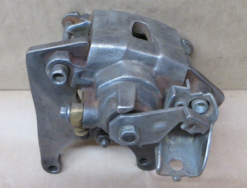 1979-1985 CADILLAC, OLDSMOBILE, BUICK REAR LEFT BRAKE CALIPER AND BRACKET