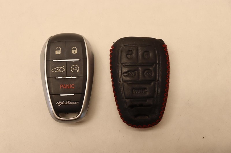 2018-2024 ALFA ROMEO STELVIO ENTRY REMOTE KEY FOB TRANSMITTER W/ CASE OEM