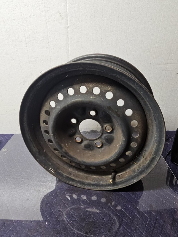 OEM 15x6.5 Black Steel Wheel fits 2001-2007 Town & Country