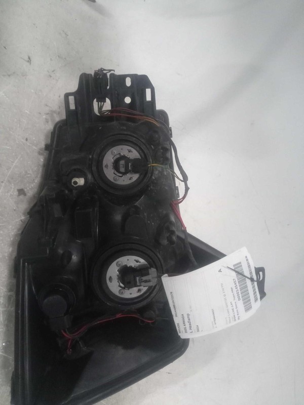 2005 Nissan Armada Left Headlight Assembly - Used, Aftermarket, 477928