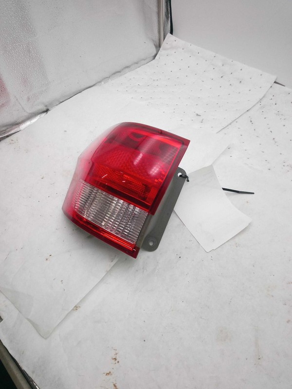 2012 Jeep Grand Cherokee Left Tail Light Assembly Red OEM 7681036 91K Miles