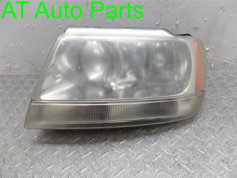 1999-2004 JEEP GRAND CHEROKEE DRIVER SIDE HEADLIGHT ASSEMBLY OEM 55155553AB