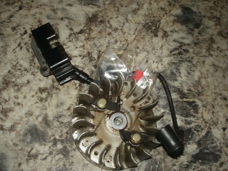 Jonsered cs 2150 cs2150 coil and flywheelchainsawpart onlybin 303