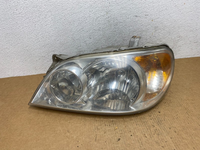 2002 to 2005 Kia Sedona Left Driver LH Side Headlight Oem AD4669 DW