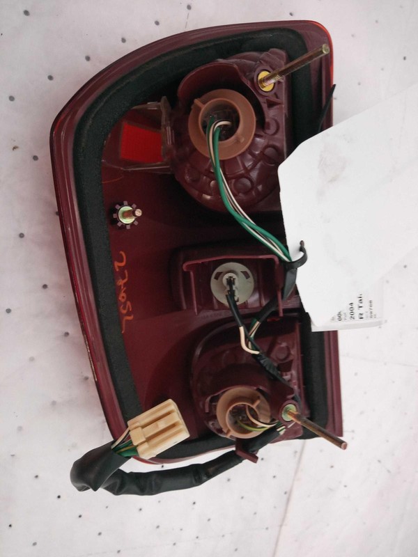 2004-2005 Toyota RAV4 Right Tail Light Assembly Silver OEM Used, Scratches