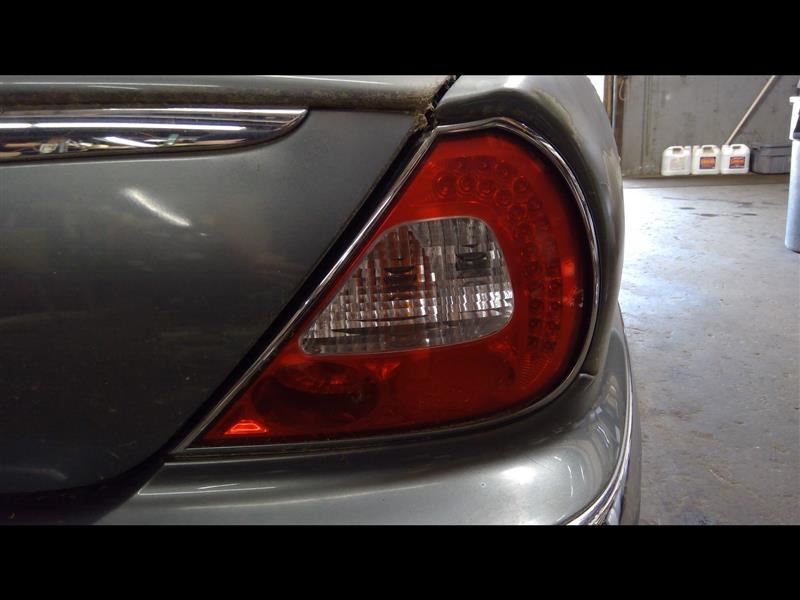 Passenger Tail Light Thru VIN H01625 Chrome Bezel Fits 04-06 XJ8 1396497