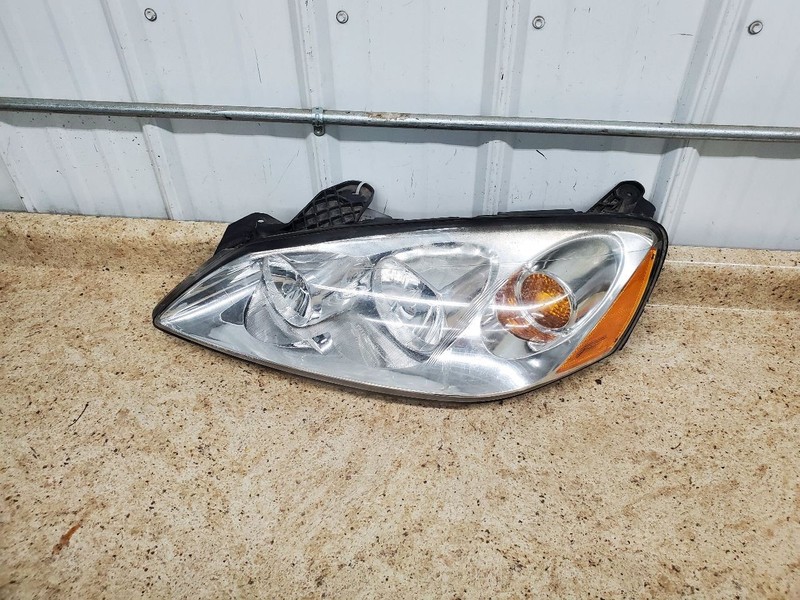 Driver Left Headlight Amber Lens Fits 05-09 G6 309492