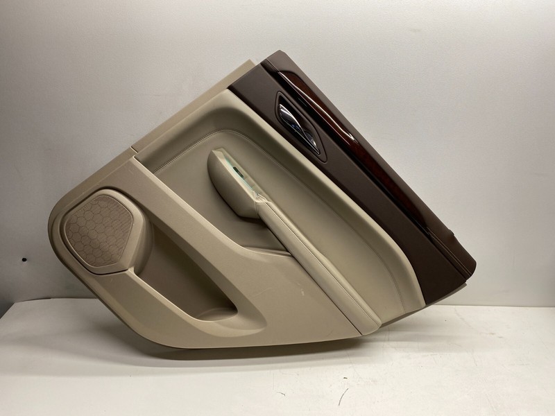 2010-2012 CADILLAC SRX RIGHT REAR INTERIOR DOOR PANEL TRIM BEUGE/BROWN
