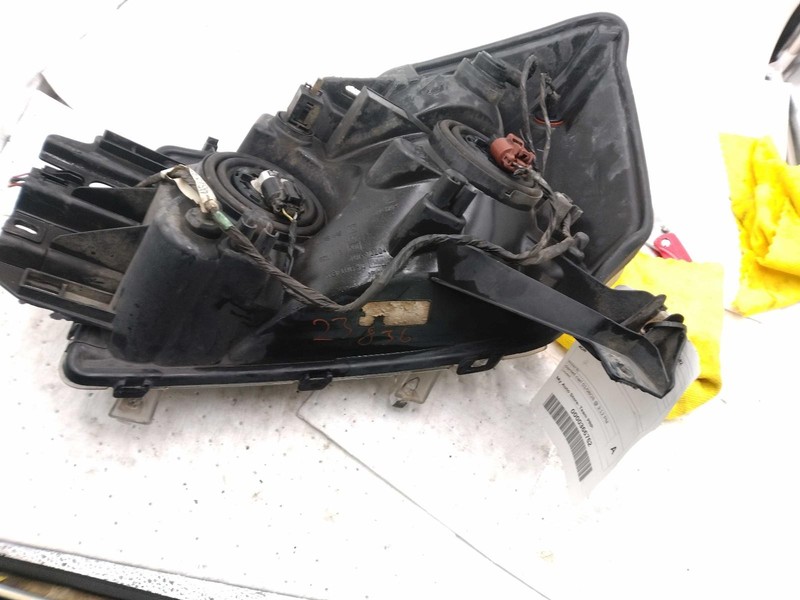 Used Right Headlight Assembly fits: 2005 Nissan Titan Right Grade B