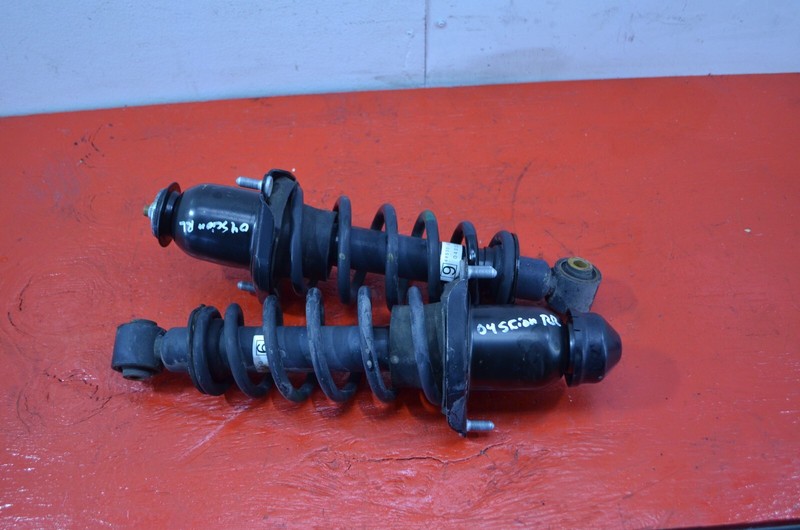 05-10 SCION TC REAR RIGHT / LEFT SHOCK STRUT ABSORBER SET OEM