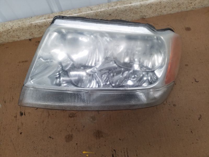 Driver Headlight Crystal Clear Fits 99-04 GRAND CHEROKEE 198437