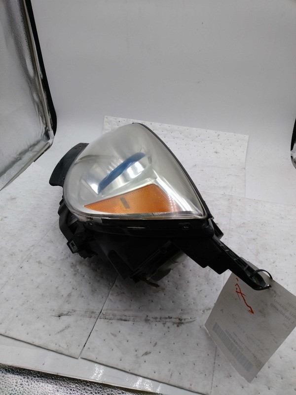 Used Left Headlight Assembly fits: 2012 Buick Verano Left Grade B