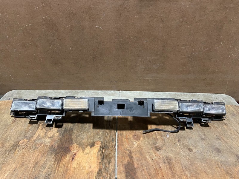 1992 to 1997 Oldsmobile Cutlass Front Headlight Header AD5966