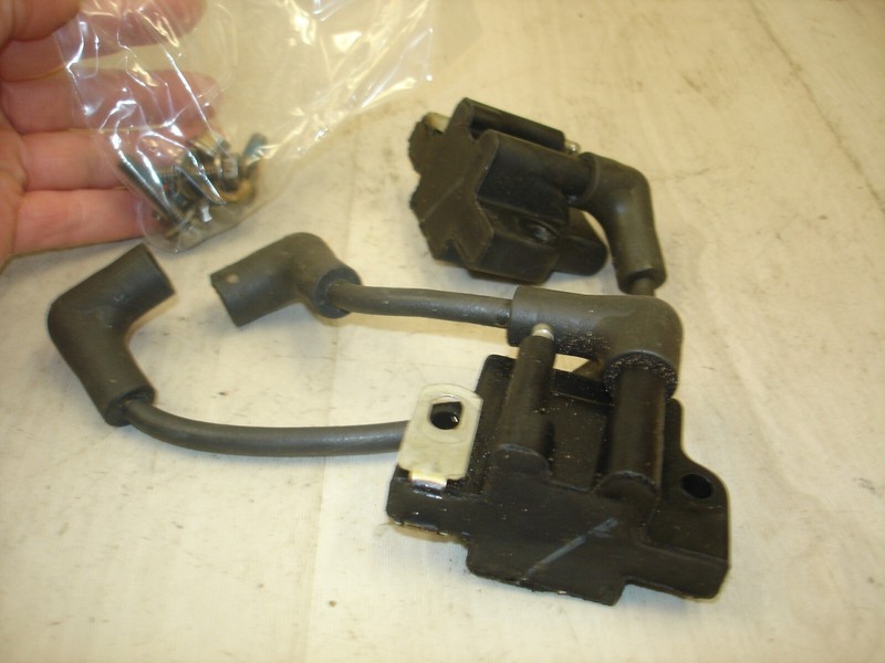 1990 Johnson 4hp deluxe J4RDHESRcoils testedboat motor part