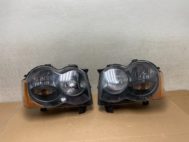 2009-2010 Jeep Grand Cherokee Left+Right Set Halogen Headlights AA9867 DW