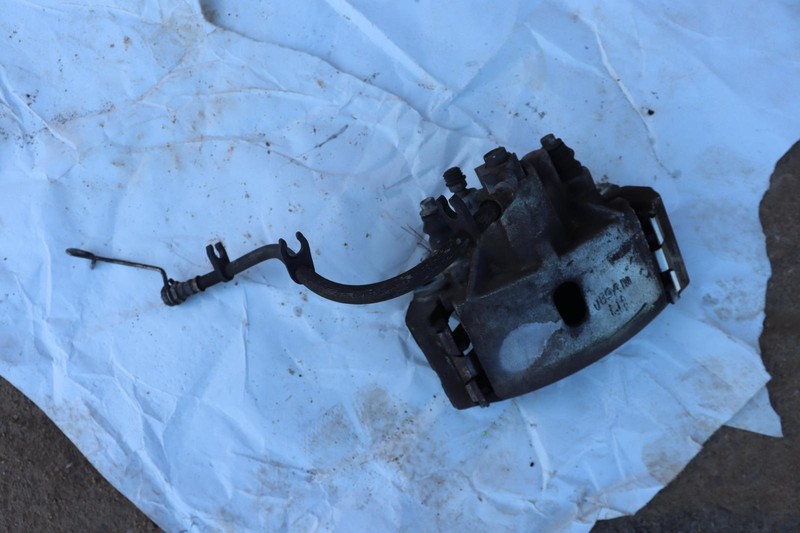 2006-2022 DODGE RAM 1500 REAR LEFT DRIVER SIDE BRAKE CALIPER W/ HOSE OEM