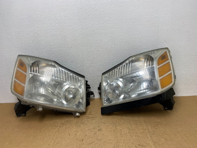 2004 to 2007 Nissan Armada Left+Right Side Set Headlights AD1380 DW