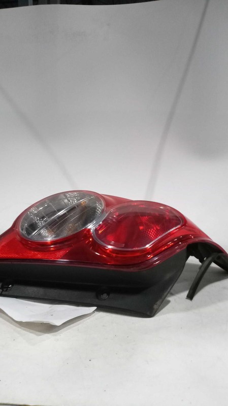2012 Chevrolet Sonic Left Tail Light Assembly Orange 308198 Used 102K Miles