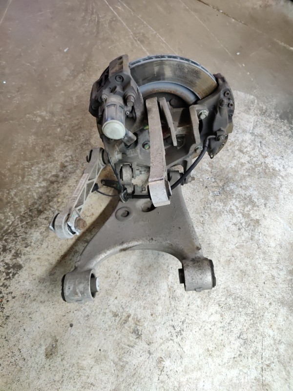 12-16 Tesla Model S Driver Left Rear Suspension Assembly W/ Caliper 27069