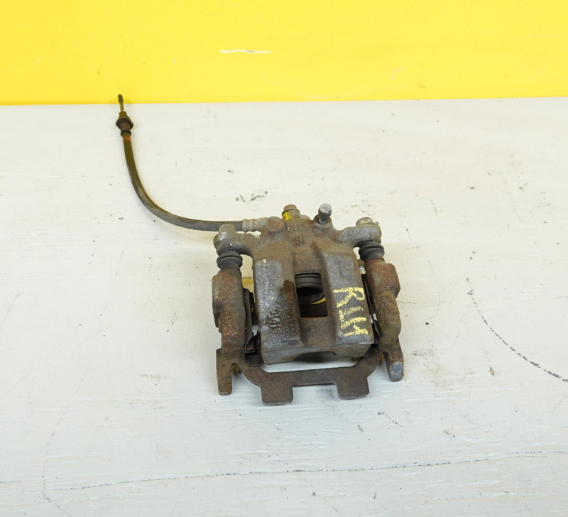 2014-2024 INFINITI Q50 REAR LEFT DRIVER SIDE WHEEL BRAKE CALIPER OEM 440111AA0A