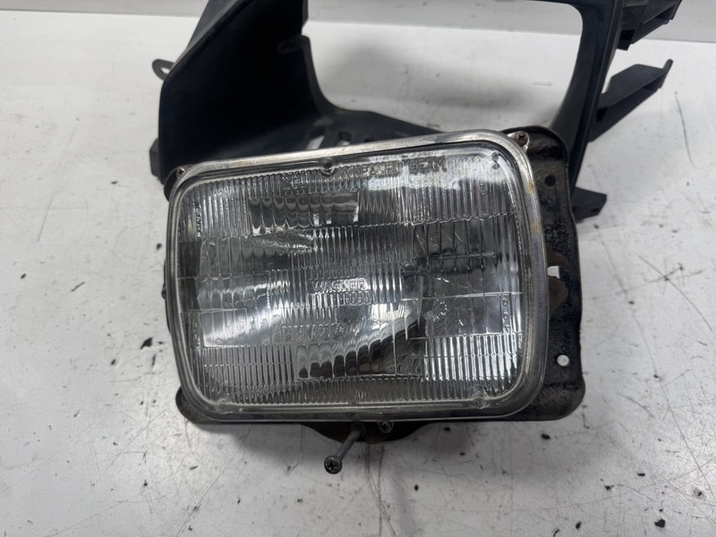 84-85 Honda Civic 4DR Left Headlight with Bezel OEM