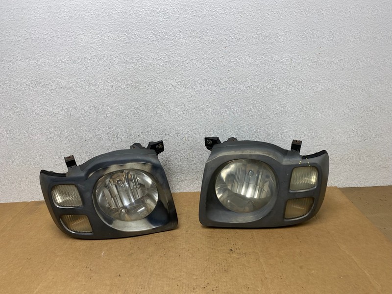 2002 2003 2004 Nissan Xterra Left+Right Side Headlights OEM AE3089 DW