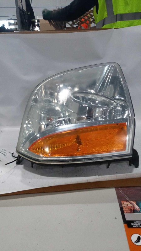 Used Right Headlight Assembly fits: 2010 Gmc Yukon Right Grade A