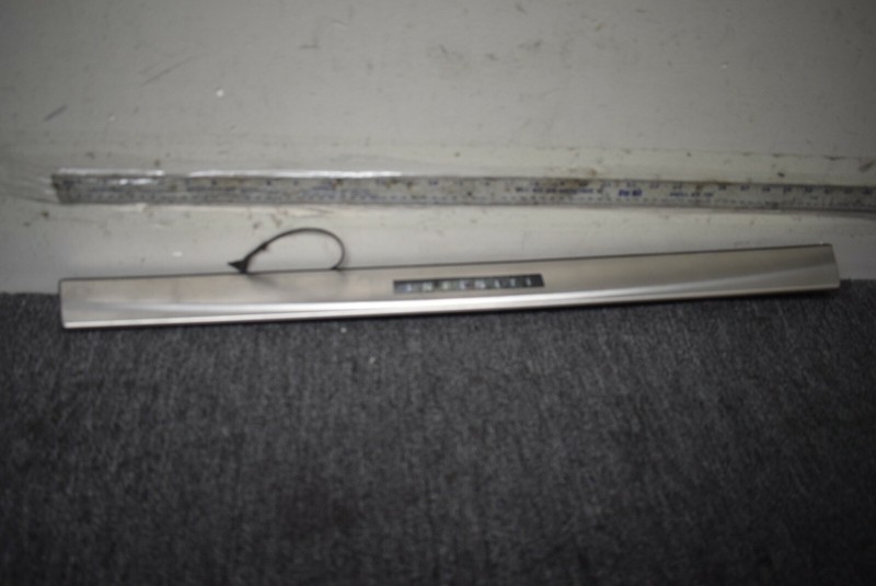 2006-2008 INFINITI M35 FRONT RIGHT SCUFF PLATE MOLDING FACTORY OEM