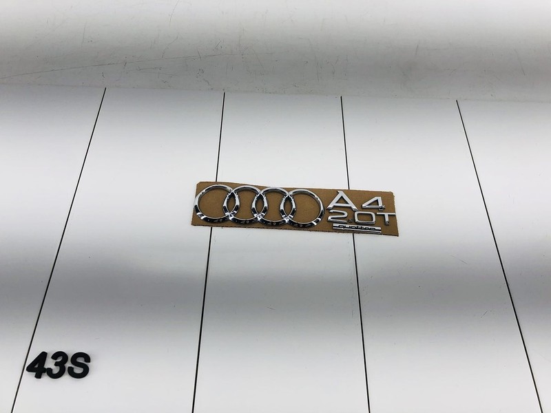 13-16 AUDI A4 QUATTRO REAR TRUNK DECK LID LOGO SYMBOL NAMEPLATE EMBLEM OEM