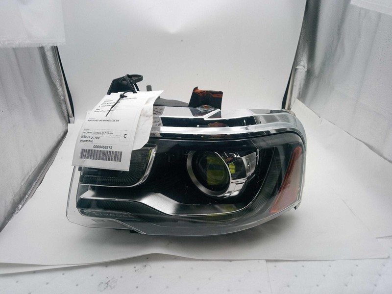 2016 Lincoln Navigator Left Headlight Assembly - Used, Scratches, Broken Tab