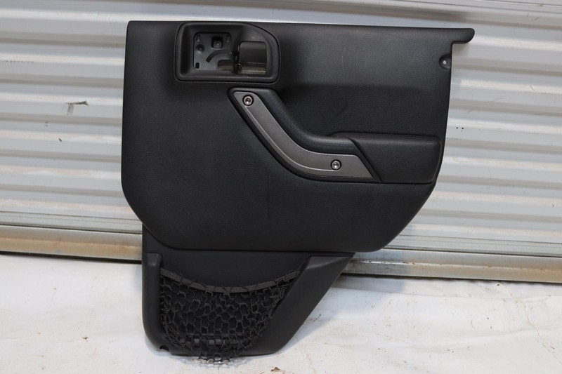2011 JEEP WRANGLER REAR RIGHT SIDE DOOR PANEL TRIM COVER BLACK OEM