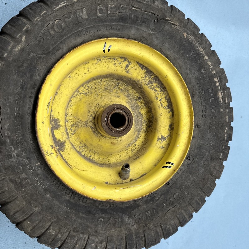 JOHN DEERE STX38 FRONT RIM 6x4.5 # 11