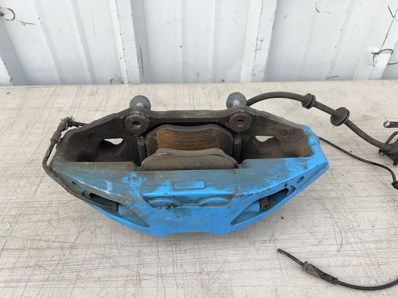 16-19 BMW 750i LEFT FRONT CALIPER PAINTED BLUE 4.4L AT AWD 72K xDRIVE 65155