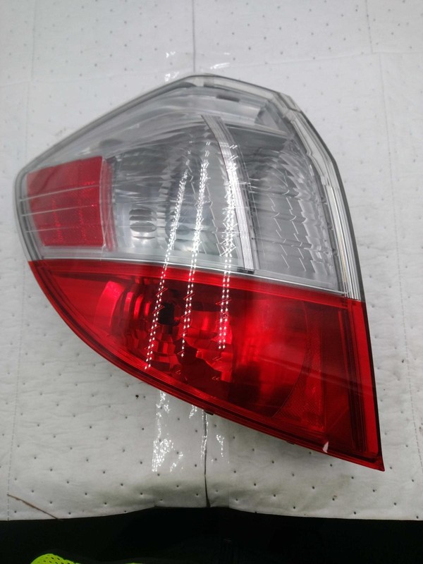 2010 Honda Fit Left Blue Tail Light Assembly OEM Used 270873 145K Miles