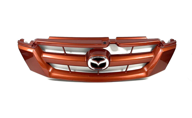 2005-2006 Mazda Tribute Front Upper Grille Grill Trim Assembly Orange OEM