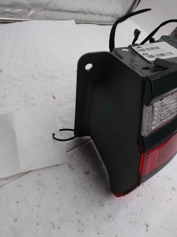 Used Left Tail Light Assembly fits: 2017 Jeep Grand cherokee quarter panel mount