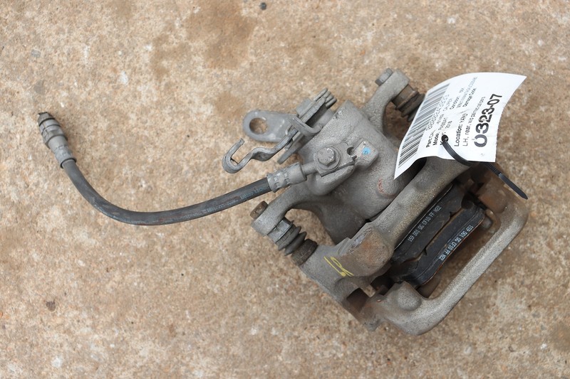 2015-2020 VOLKSWAGEN PASSAT REAR LEFT DRIVER SIDE BRAKE CALIPER ASSEMBLY OEM