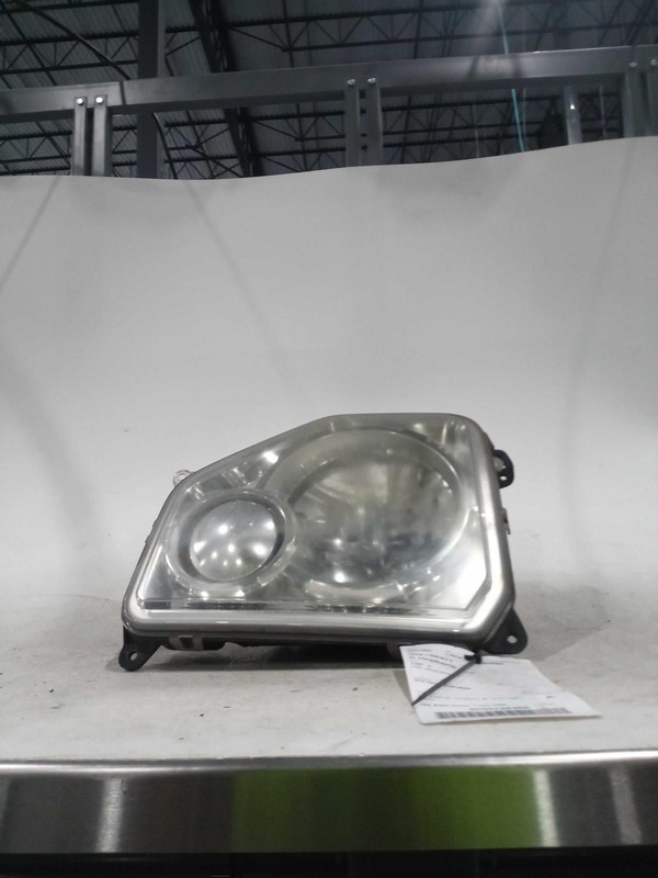Used Right Headlight Assembly fits: 2008 Jeep Liberty LHD chrome bezel w/fog lam