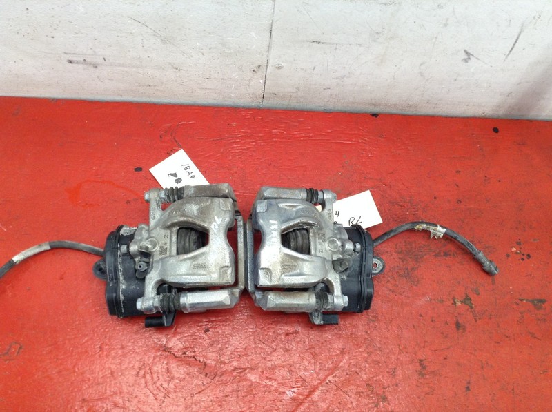17-19 AUDI A4 FWD REAR RIGHT / LEFT BRAKE CALIPER SET OEM