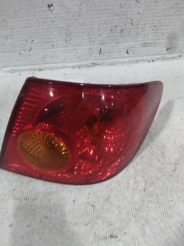 2003-2004 Toyota Corolla Right Tail Light Assembly Black OEM Used 146583
