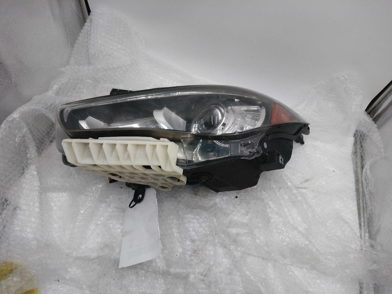 2017 INFINITI Q50 Left Headlight Assembly Brown OEM 535490 - Damage on Lens