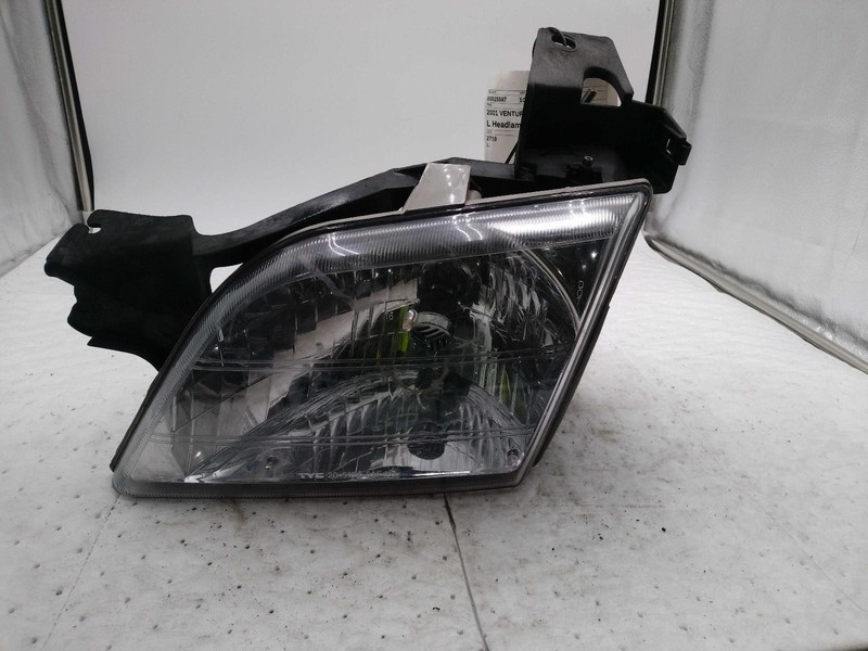 2001 Chevrolet Venture Left Headlight Assembly Tan OEM 396739 155k Miles